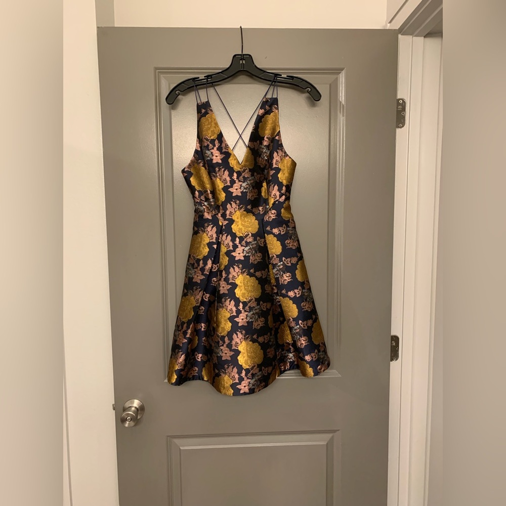 Elegant Floral Dress in Black and Gold